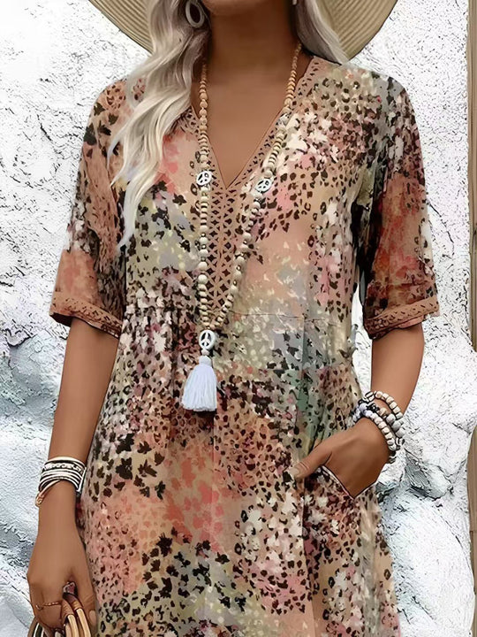Damen Maxikleid mit V-Ausschnitt und praktischen Seitentaschen EB