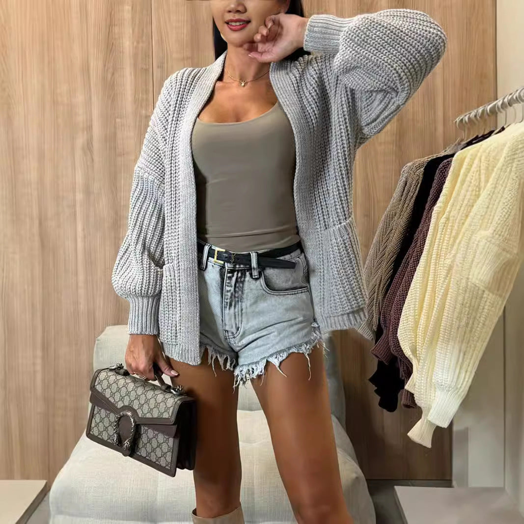 Damen Strickjacke mit strukturierter Oberfläche und voluminösen Ärmeln EB