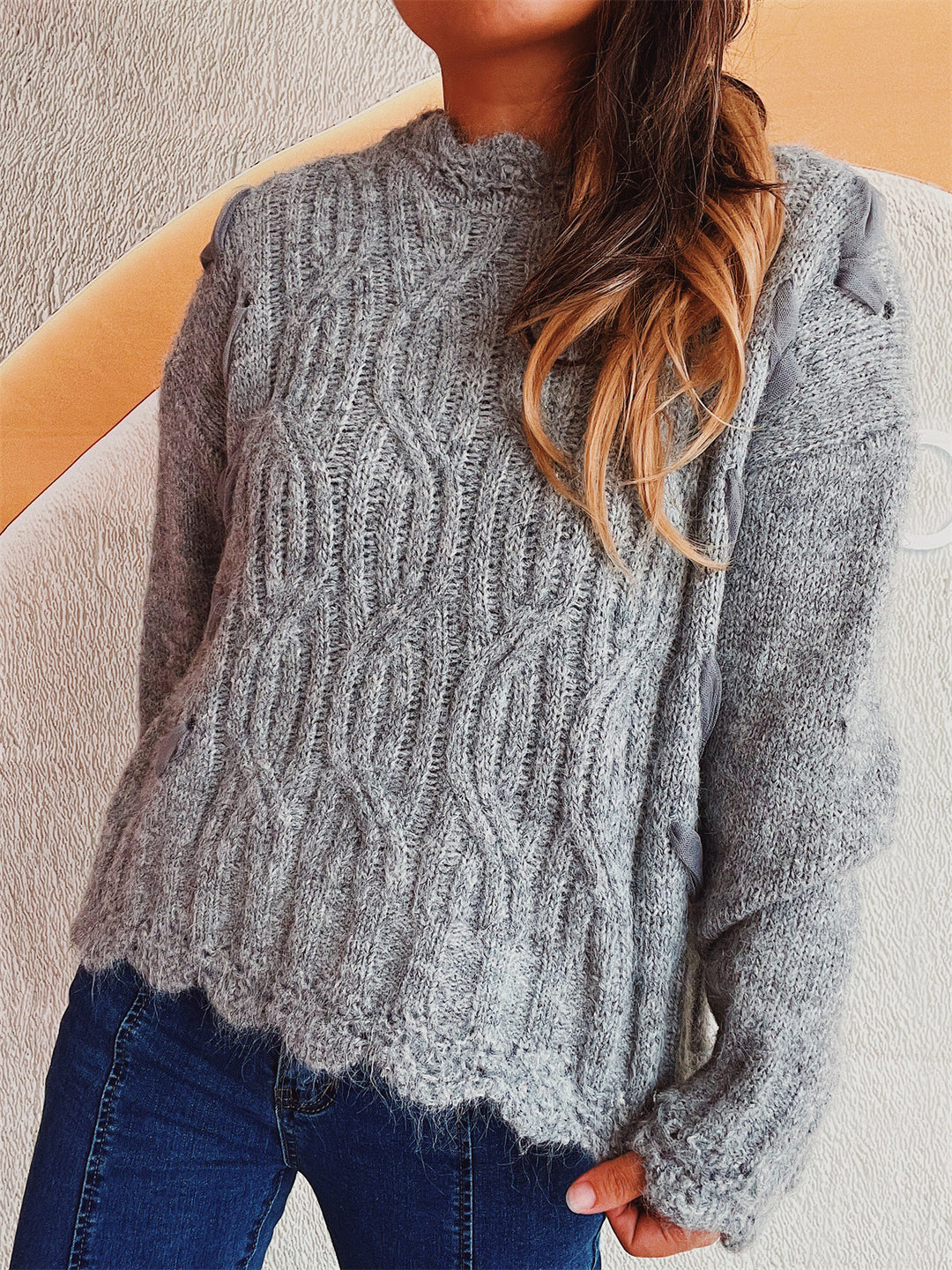Damen Grobstrickpullover mit romantischem Wellenmuster und volumetrischen Ärmeln EB
