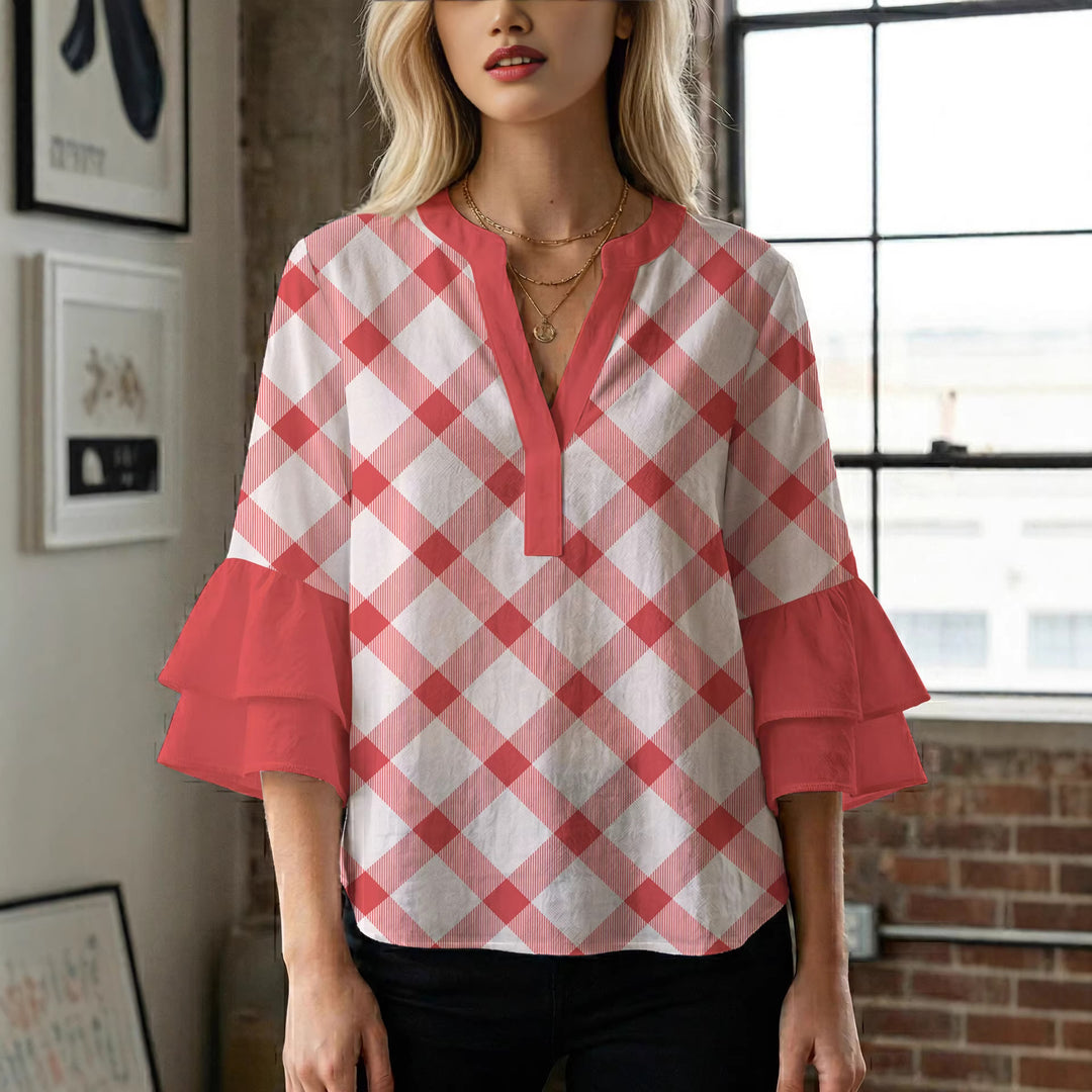 Damen Bluse mit voluminösen Flügelärmel und intensivem Blattmuster EB