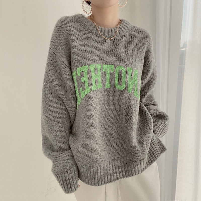 Damen Oversized Pullover mit auffälligem Schriftzug und gestricktem Muster EB