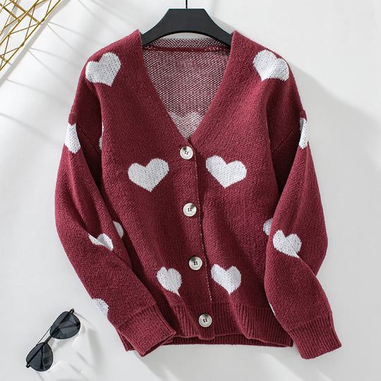 Damen modische Strickjacke mit Herzmotiven und Knöpfen EB