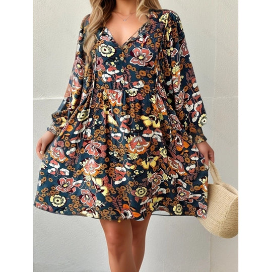 Damen lässiges Freizeitkleid mit lockerer Passform und buntem Blumendesign EB