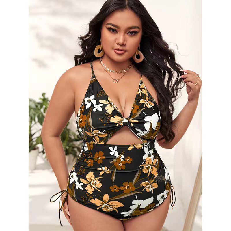 Damen Einteiler Badeanzug mit modischem Cut-Out und buntem geometrischem Design EB