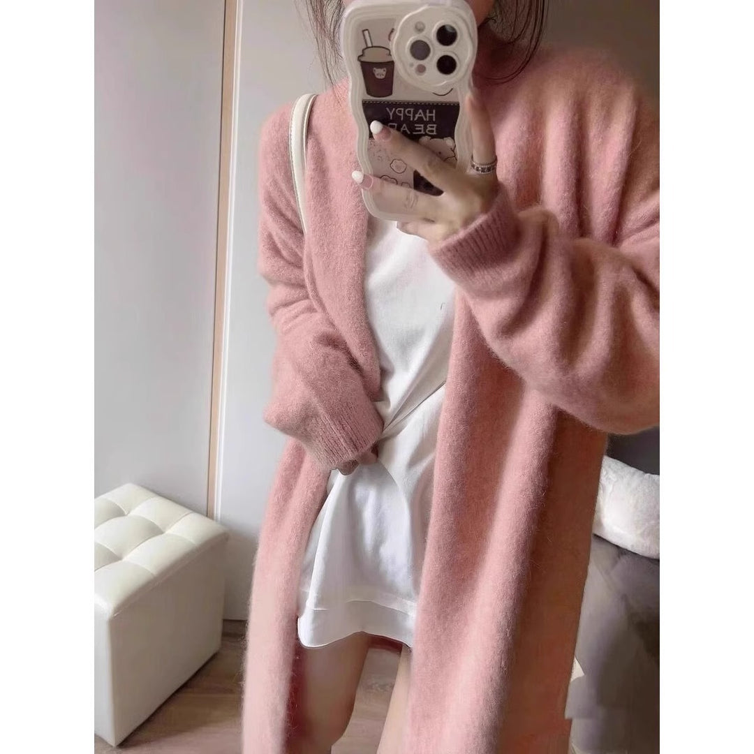 Damen Gemütliche Strickjacke mit oversized Schnitt und sanften Puffärmeln EB
