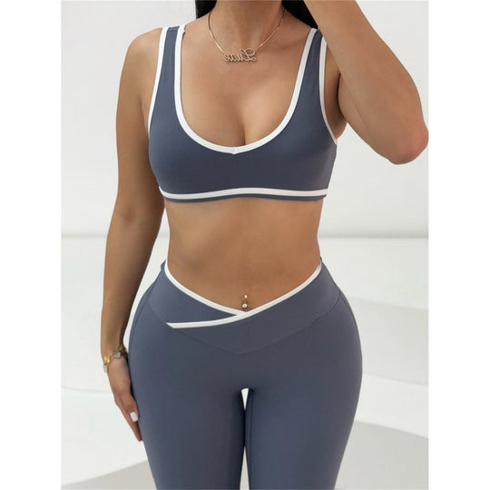 Damen Sportliches Zweiteiler Set mit kurzer Oberteil und flared Leggings EB