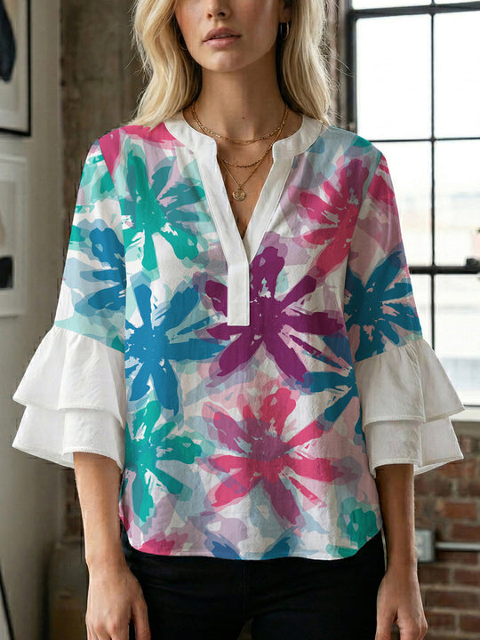 Damen Bluse mit voluminösen Ärmeln und floralem Design EB