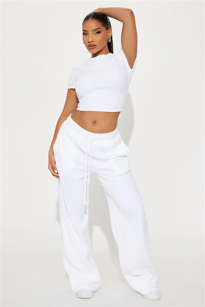 Damen Velours-Hausanzug mit bauchfreiem Shirt und weit geschnittener taillenhoher Jogginghose EB