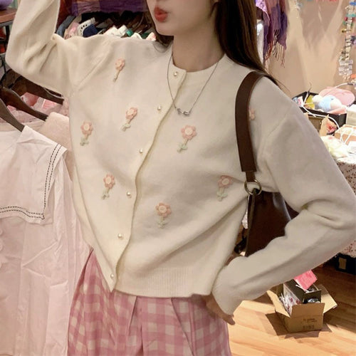 Damen Strickjacke mit kunstvollen Blumenapplikationen und eleganten Perlenknöpfen EB