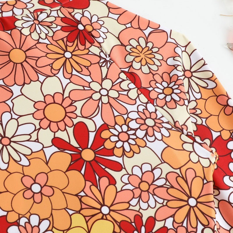 Damen Langarm-Badeanzug mit floralem Design und herausziehbarem Reißverschluss EB