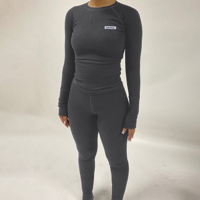 Damen Sportliches Funktions-Set mit langärmligem Oberteil und enganliegender Hose EB