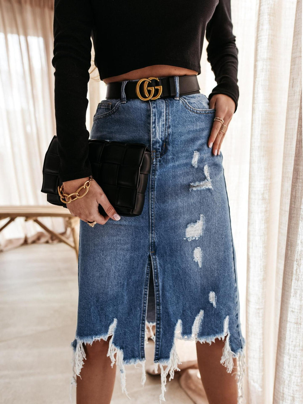 Damen Jeansrock mit ausgefransten Säumen und dekorativen Rissen EB