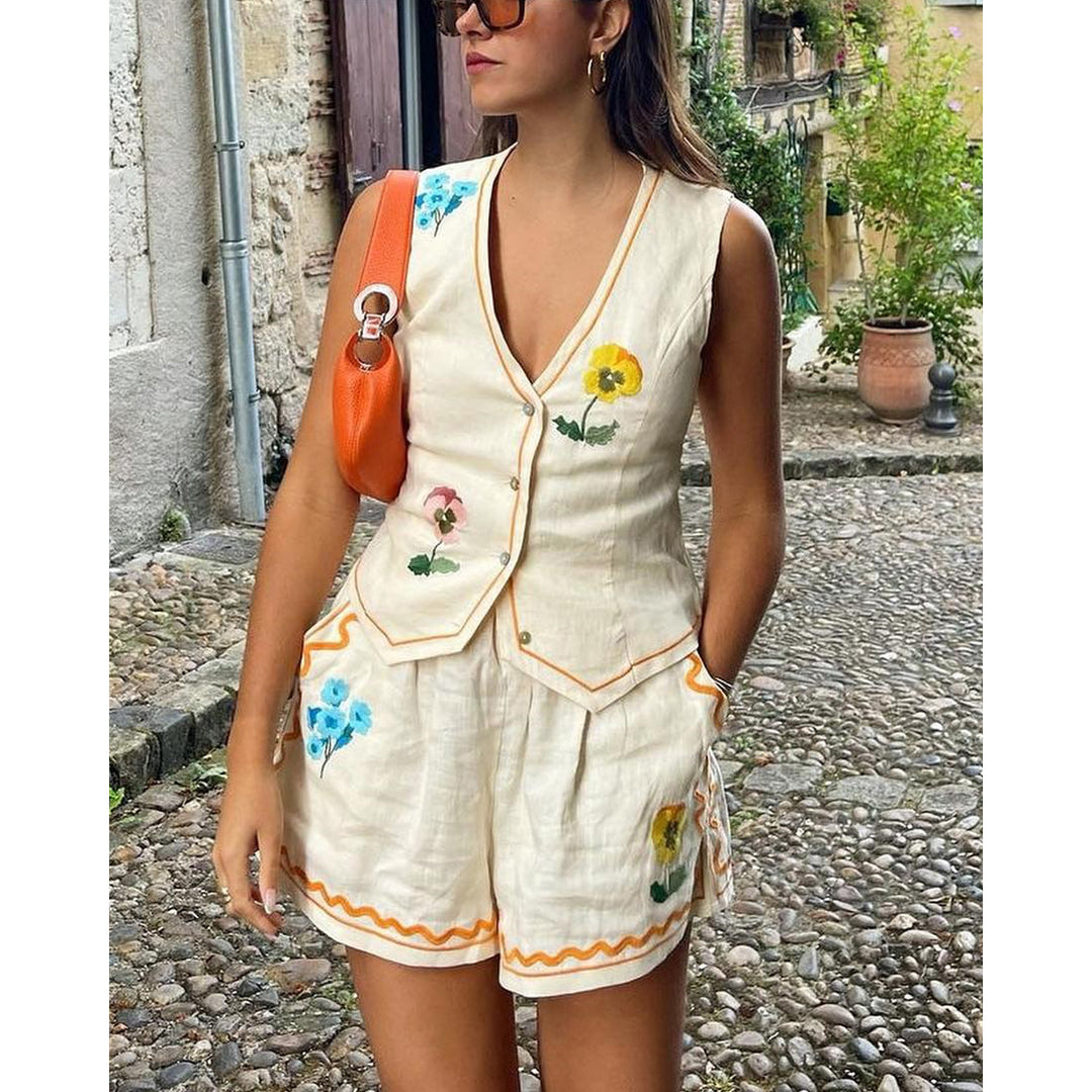Damen Set aus ärmellosem Blusenkleid und Shorts mit floralem Design EB