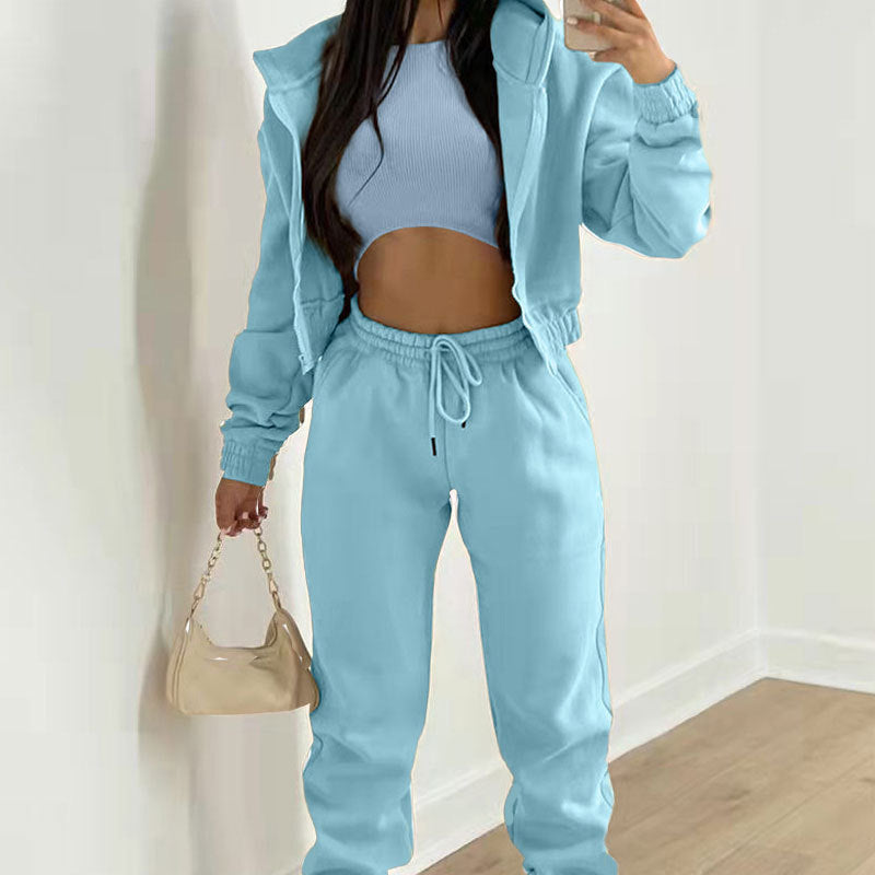 Damen stylischer Sportanzug mit lässiger Kapuzenjacke und elastischen Bundelementen EB