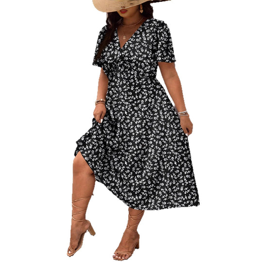 Damen Midi-Kleid mit Blumenmuster und vorteilhaftem Schlitz EB