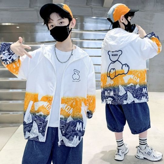 Unisex nan leichte winddichte Kapuzenjacke mit allover Grafikprint und reflektierenden Einsätzen für Kinder  EB