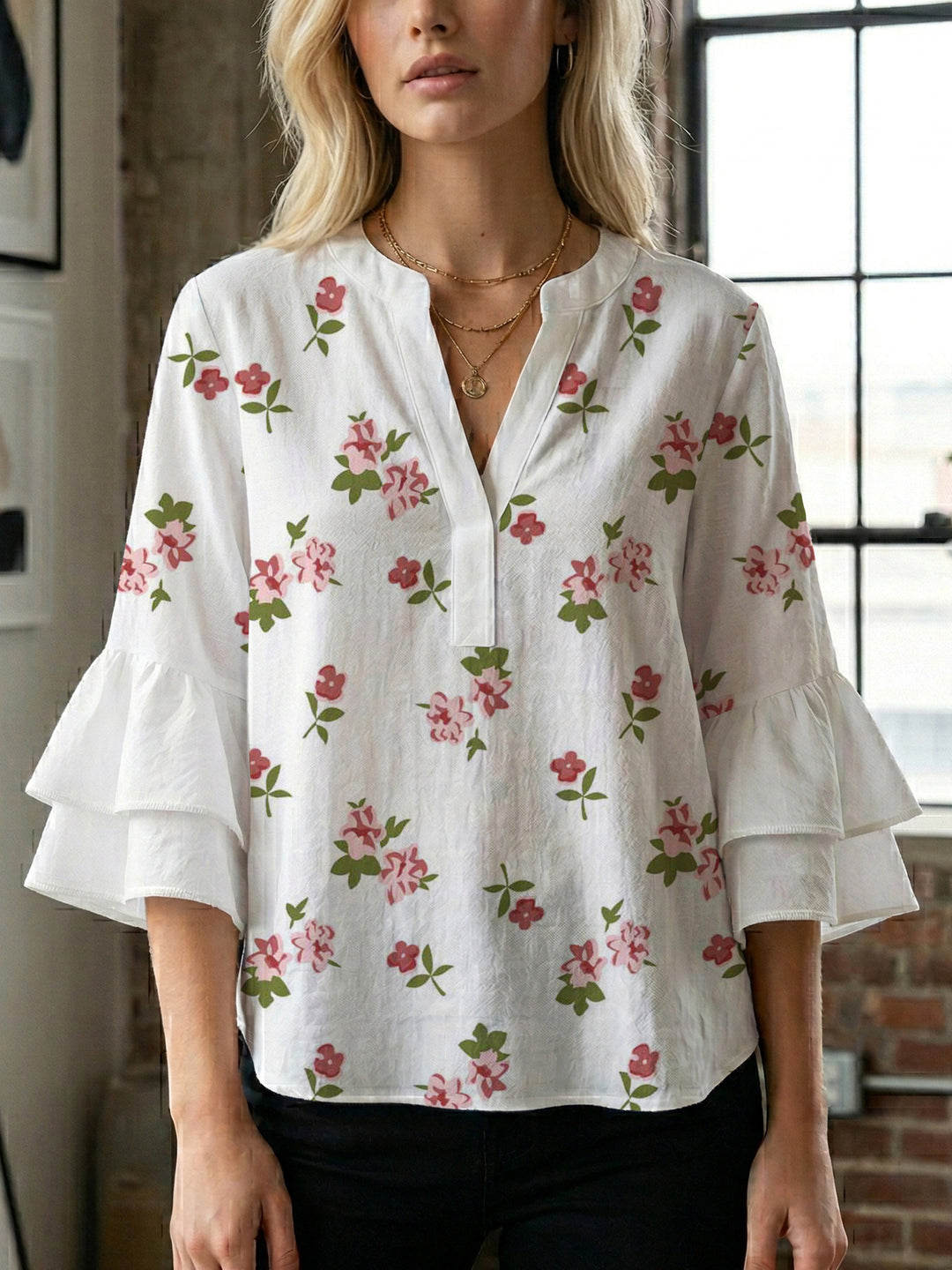 Damen Bluse mit voluminösen Rüschenärmeln und modernem Motiv EB