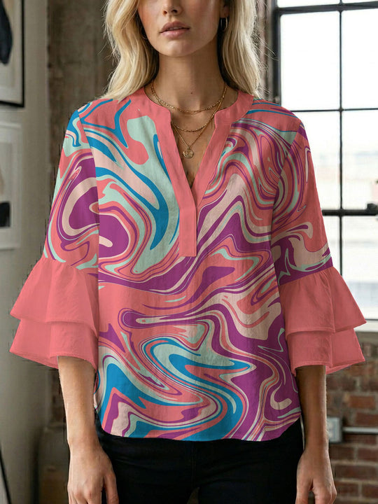 Damen Bluse mit voluminösen Flügelärmel und intensivem Blattmuster EB