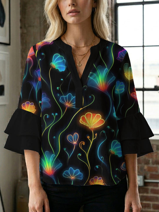Damen Bluse mit voluminösen Rüschenärmeln und floralem Muster EB