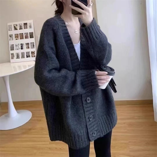Damen Grobstrickjacke mit voluminösen Ärmeln und knöpfbarem Ausschnitt EB