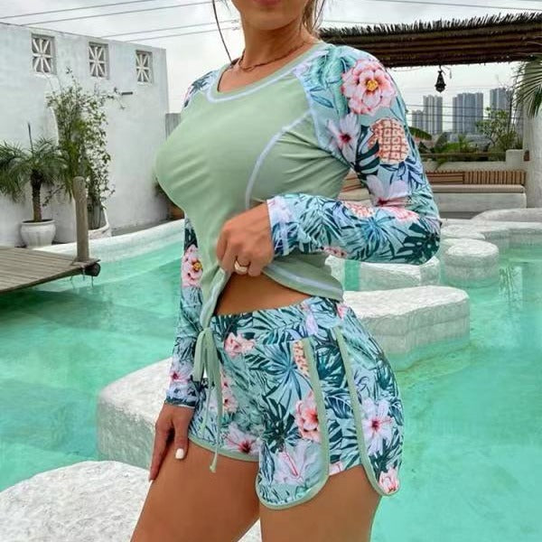 Damen Sportliches Langarm-Badeoberteil mit floralem Design und Shorts EB