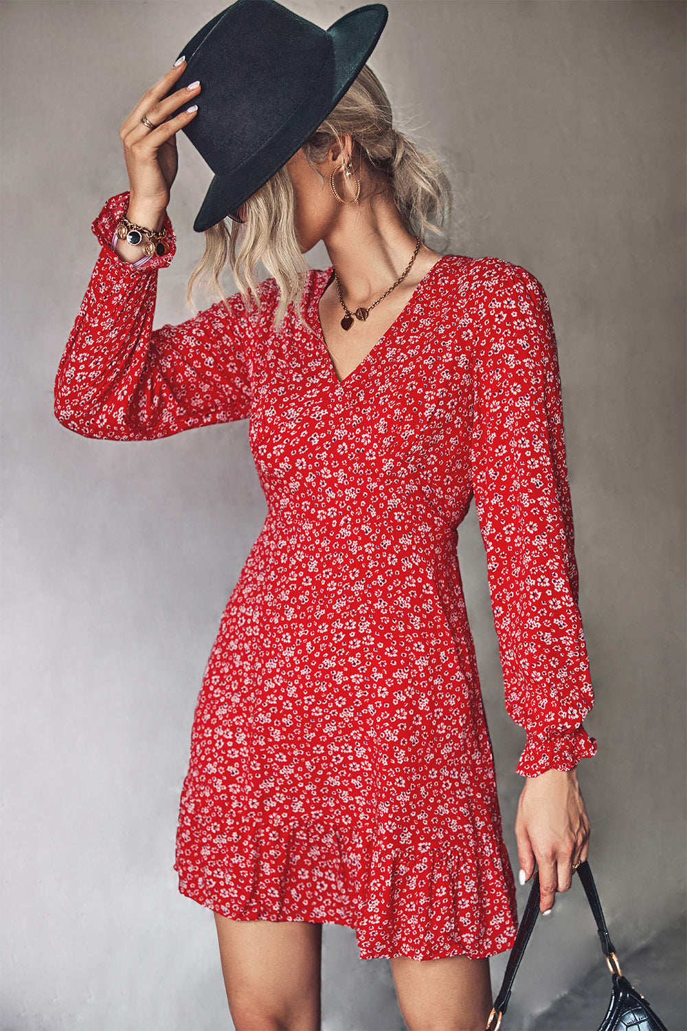 Damen Minikleid mit verspieltem floralem Muster und femininem V-Ausschnitt EB