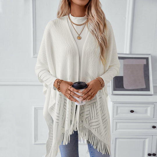 Damen eleganter Strickponcho mit fransigen Details und markantem Muster EB