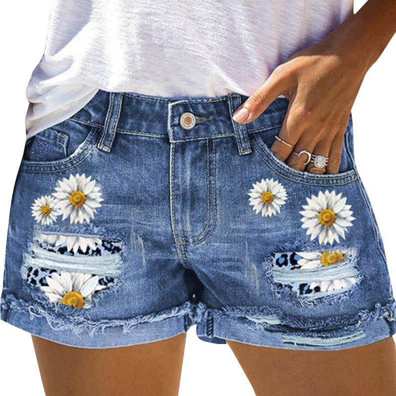 Damen Jeansshorts mit auffälligen Blumenapplikationen und lässigem Schnitt EB