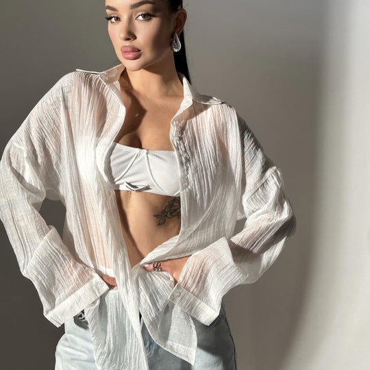 Damen lässige Hemdbluse mit oversized Schnitt und Knopfdetails EB