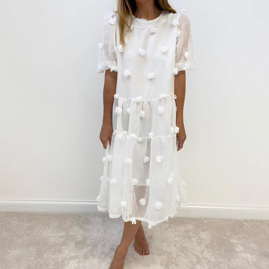 Damen Kleid mit volumetrischen Puffärmeln und dekorativen Fransen EB