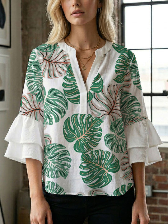 Damen Bluse mit voluminösen Flügelärmel und intensivem Blattmuster EB