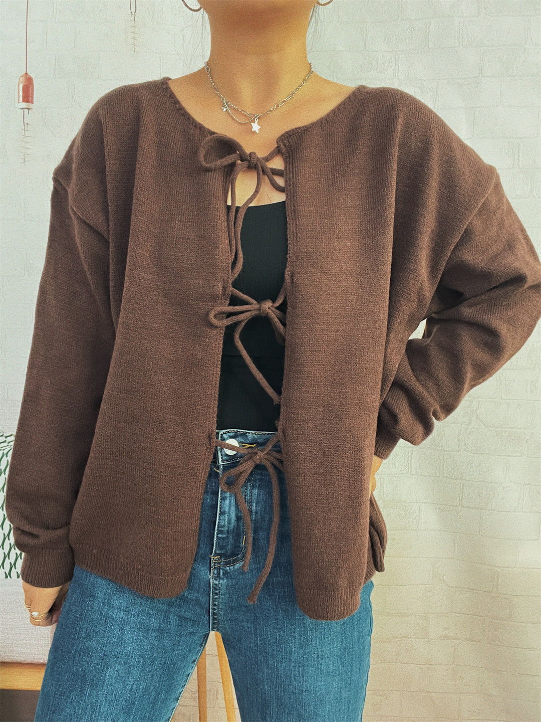 Damen Strickjacke mit dekorativem Schnürdesign und weitem Schnitt EB