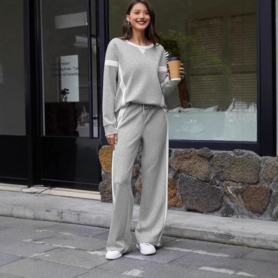 Damen nan sportives Lounge-Set mit weitem Sweatshirt, Palazzohose und seitlichen Kontraststreifen EB