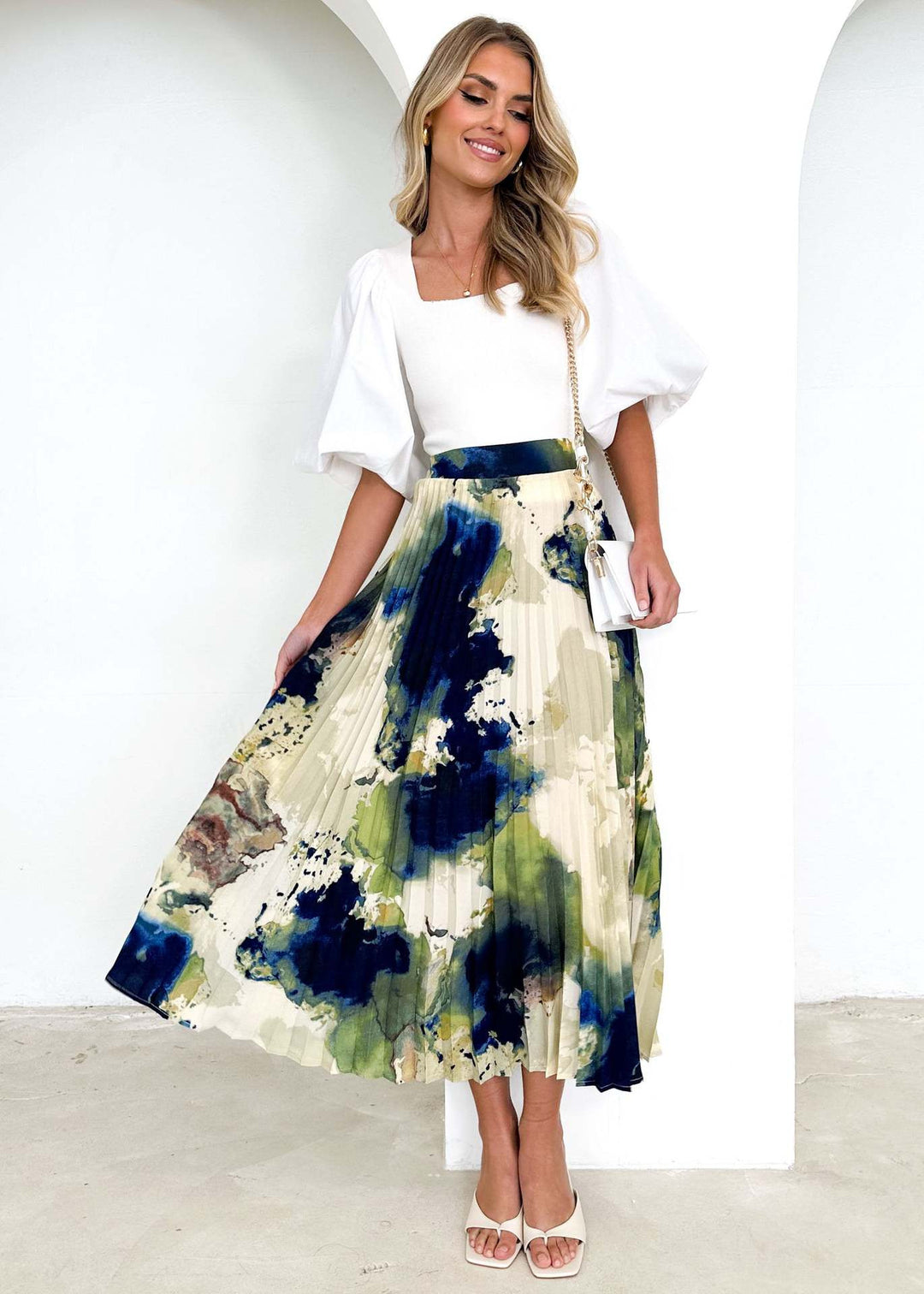 Damen Eleganter Plissee-Rock mit floralem Design und elastischem Bund EB