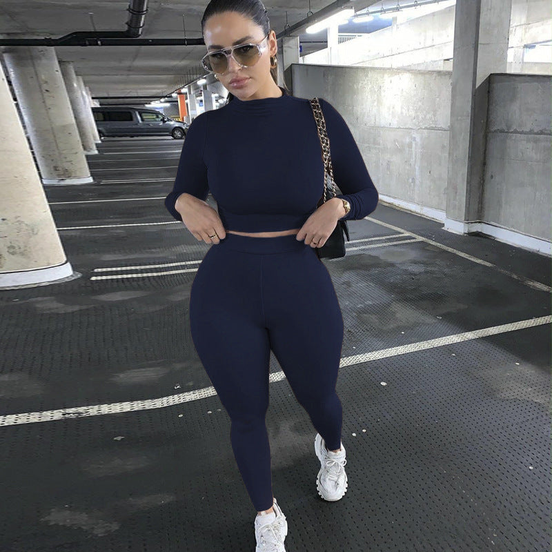 Damen Sportliches Set mit hochgeschlossenem Oberteil und enganliegenden Leggings EB
