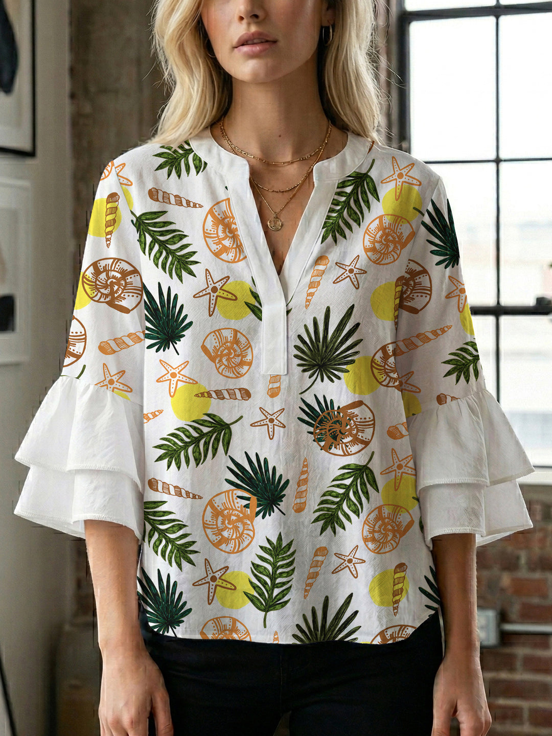 Damen Bluse mit voluminösen Rüschenärmeln und modernem Motiv EB