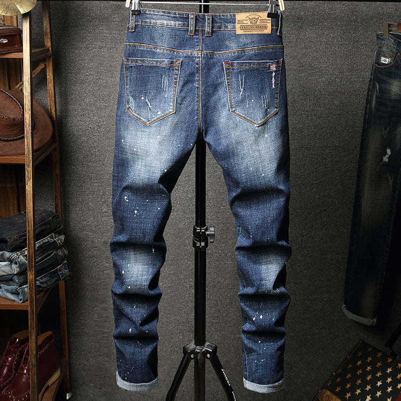 Herren Ripped Slim Fit Jeans mit kreativen Farbklecksen und modischem Destroyed-Look EB