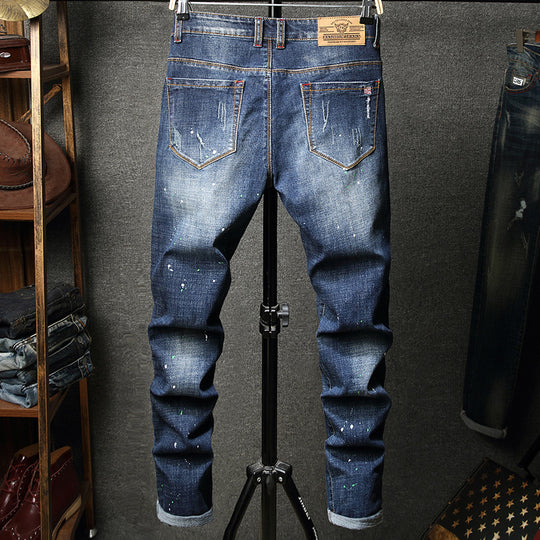 Herren Ripped Slim Fit Jeans mit kreativen Farbklecksen und modischem Destroyed-Look EB