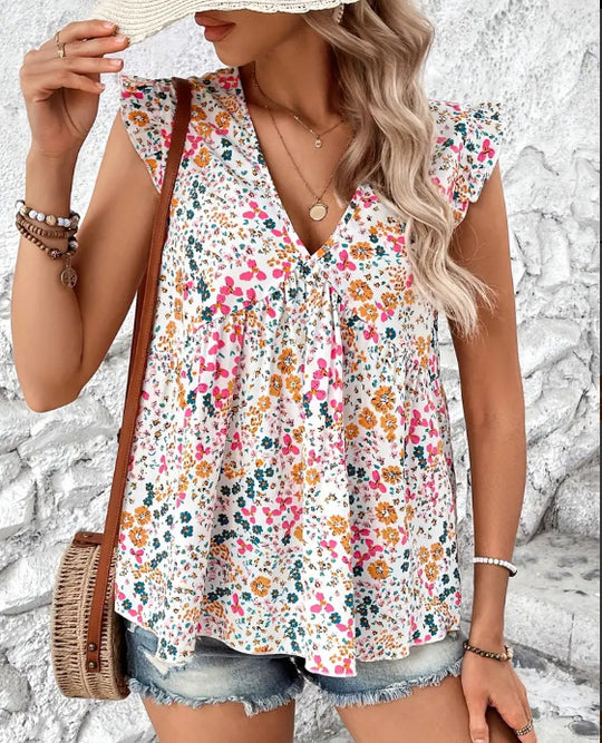 Damen Bluse mit floralem Design und voluminösen Ärmeln EB