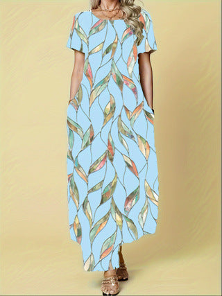 Damen Maxikleid mit lebhaftem Blattmuster und praktischen Taschen EB