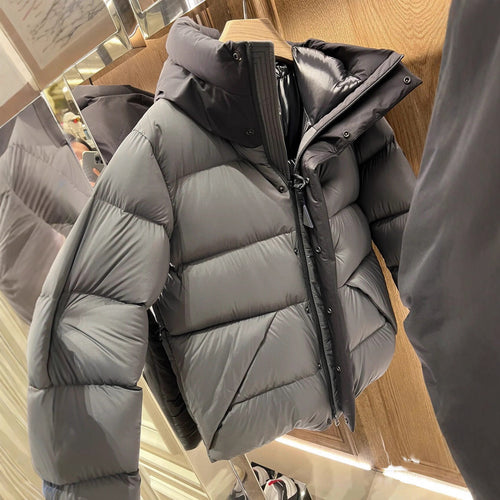 Damen Daunenjacke mit hohem Kragen und praktischen Reißverschlusstaschen EB