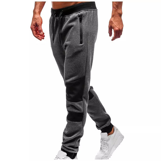 Herren nan schmal geschnittene Jogginghose mit Reißverschlusstaschen, elastischem Komfortbund und verstärkten Knie-Paneelen EB