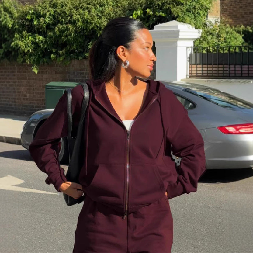 Damen gekürztes Kapuzen-Sweatshirt mit Oversize-Ärmeln und high-waist Wide-Leg Freizeithose Eichborn Berlin