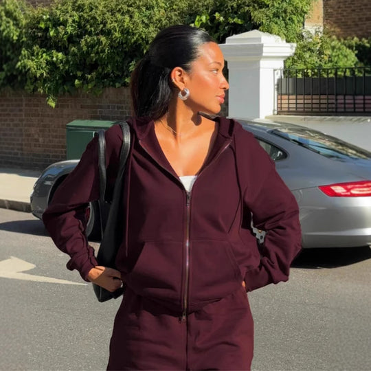 Damen gekürztes Kapuzen-Sweatshirt mit Oversize-Ärmeln und high-waist Wide-Leg Freizeithose Eichborn Berlin