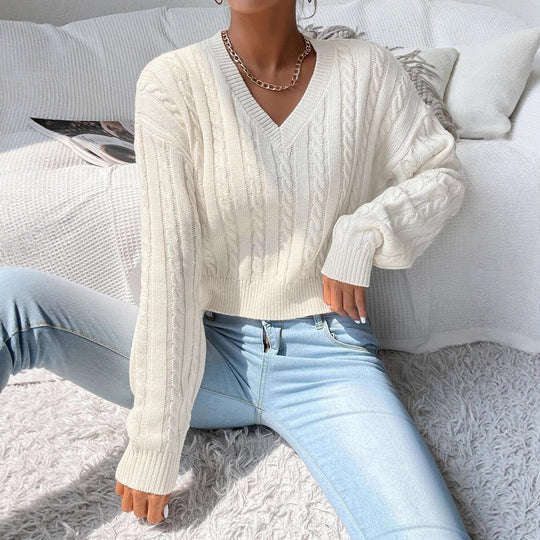 Damen Grobstrickpullover mit V-Ausschnitt und voluminösen Ärmeln EB