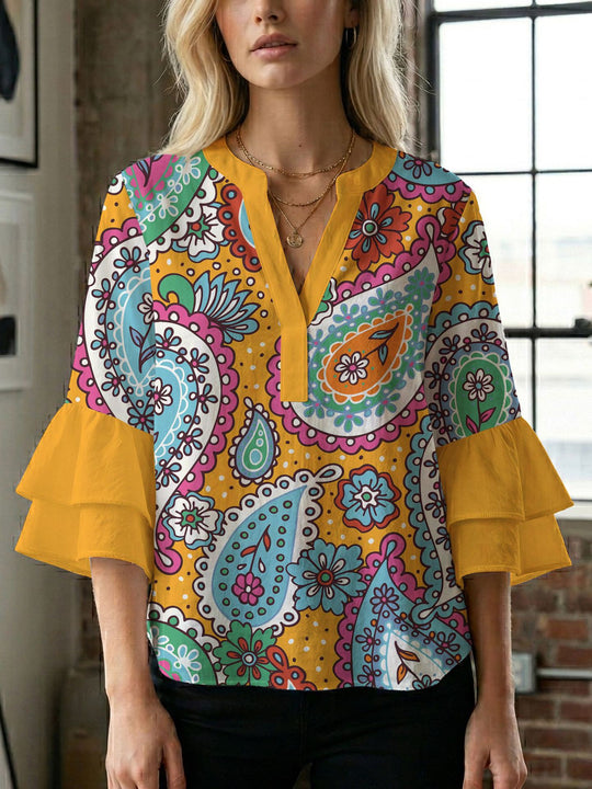 Damen Bluse mit voluminösen Flügelärmel und intensivem Blattmuster EB