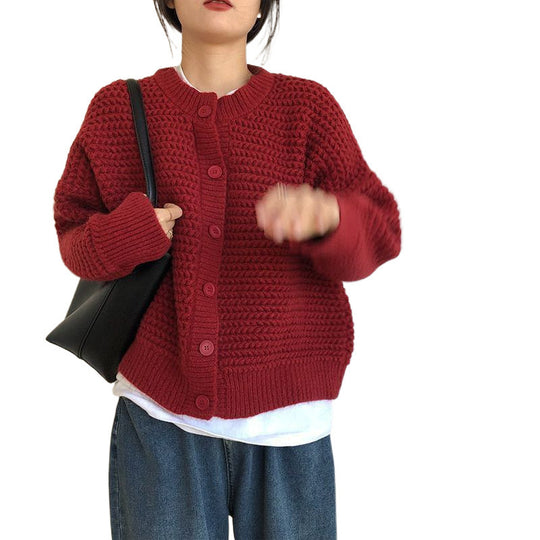 Damen Grobstrickjacke mit Knopfdetails und oversized Schnitt EB