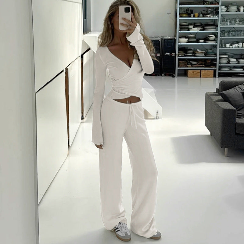 Damen nan Wickel-Cropped-Top mit tiefem V‑Ausschnitt, taillierter Wickelform und langen Glockenärmeln EB
