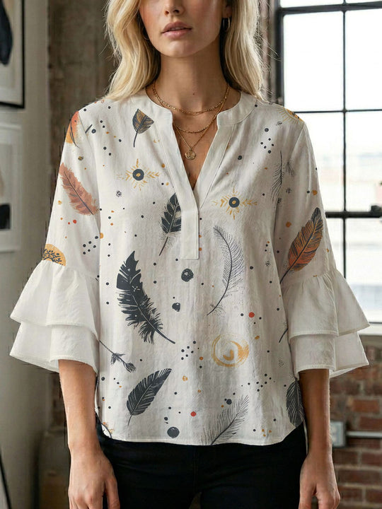 Damen Blusenshirt mit voluminösen Ärmeln und kreativem Druckdesign EB