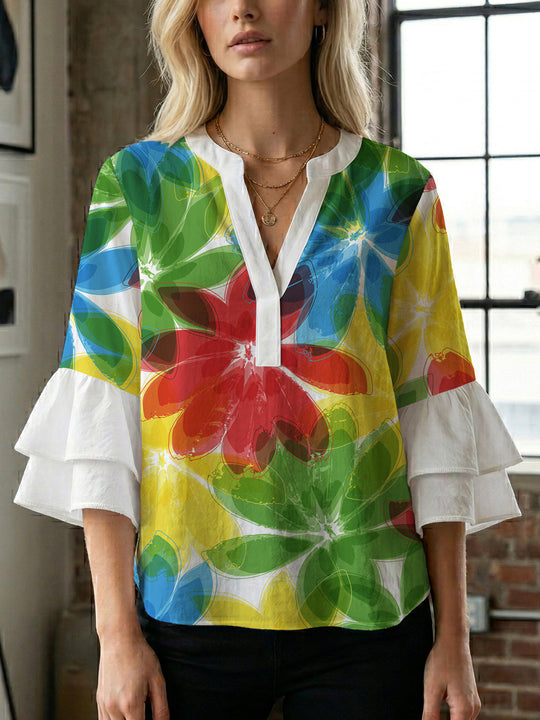 Damen Bluse mit voluminösen Rüschenärmeln und floralem Muster EB